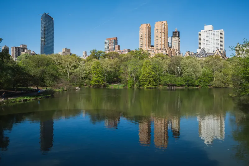 Central Park West skyline reflected in the Lake