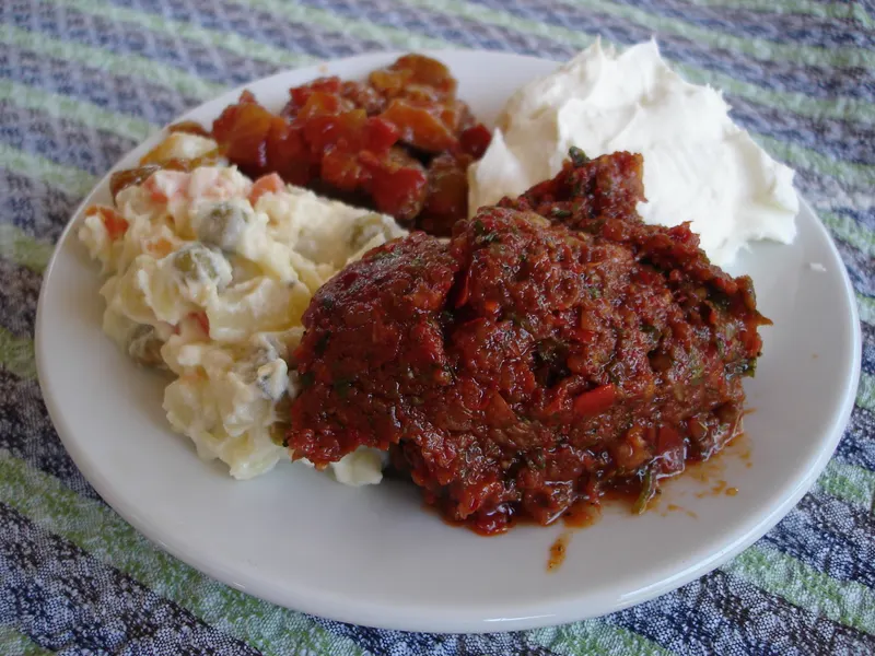 Turkish meze plate with ezme, Russian salad and yogurt dip
